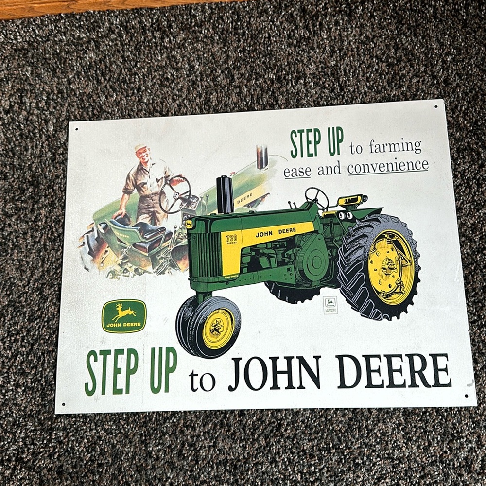 John Deere wall plaque.